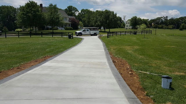 Large and Spacious Concrete Driveway in Northern Virginia, designed by the crew at Blackwater Designer Concrete.