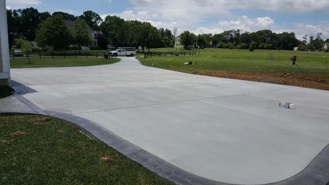 Large and Spacious Concrete Driveway in Northern Virginia, designed by the crew at Blackwater Designer Concrete.